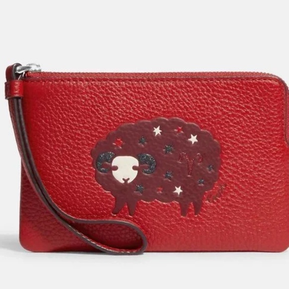 Coach Handbags - NWT Coach Corner Zip Zodiac Wristlet In Canvas Leather With Aries CF538